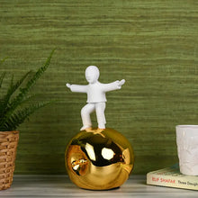 Load image into Gallery viewer, Men Standing on Big Apple Gold Home Decor Statue