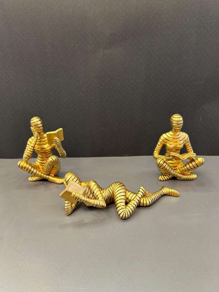 Gold Humanoid Reading Artefact Elegant Decorative Piece (Set)