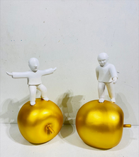 Load image into Gallery viewer, Men Standing on Big Apple Gold Home Decor Statue