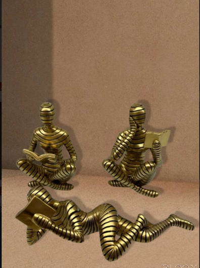 Gold Humanoid Reading Artefact Elegant Decorative Piece (Set)