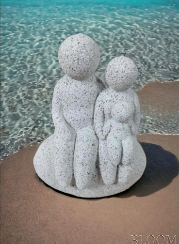 White Colour Artefact of Family Seated on a Rock