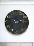 Golden Wall Clock with Black Interior Numeric and Word Out Time Display