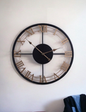 Black Plated Wall Clock with Cream Roman Numerals Stylish Elegance for Any Space