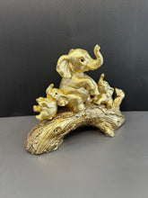 Load image into Gallery viewer, Golden Colour Elephant Artefact Seated on Wood with Two Baby Elephants