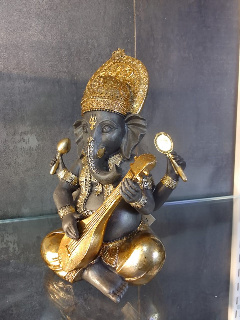 God Idol
Ganesha Idol
Lord Ganesha Idol Playing Violin