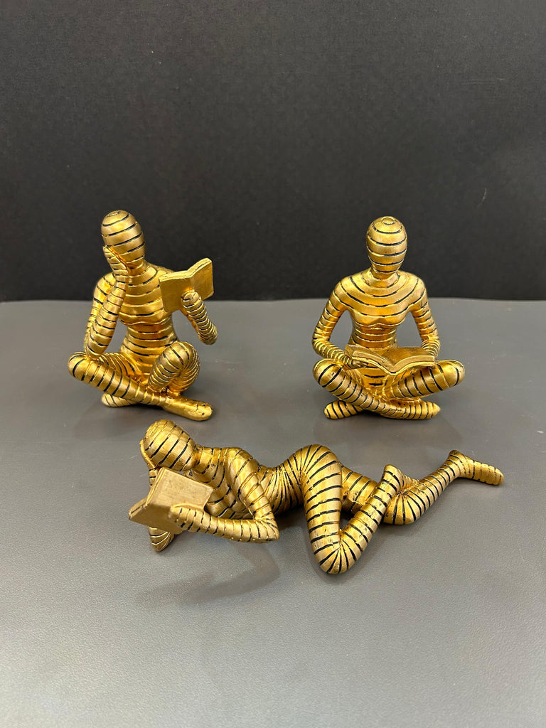 Gold Humanoid Reading Artefact Elegant Decorative Piece (Set)