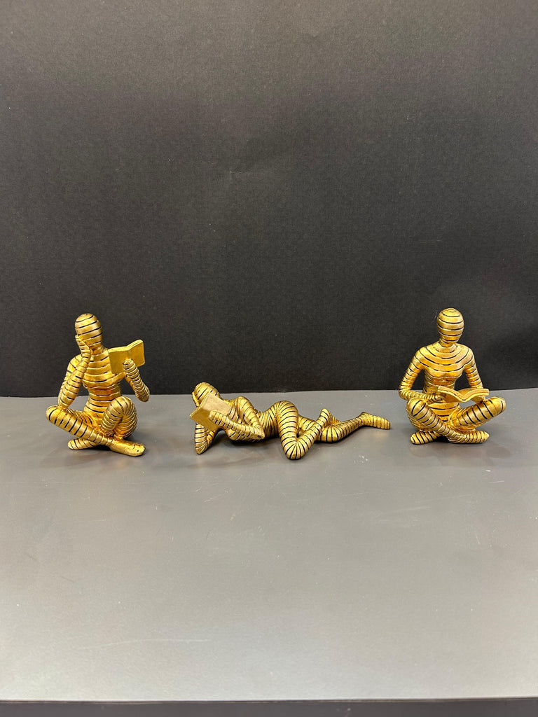 Gold Humanoid Reading Artefact Elegant Decorative Piece (Set)