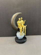 Load image into Gallery viewer, Couple Sitting on Moon Shaped Artefact For Home Decor